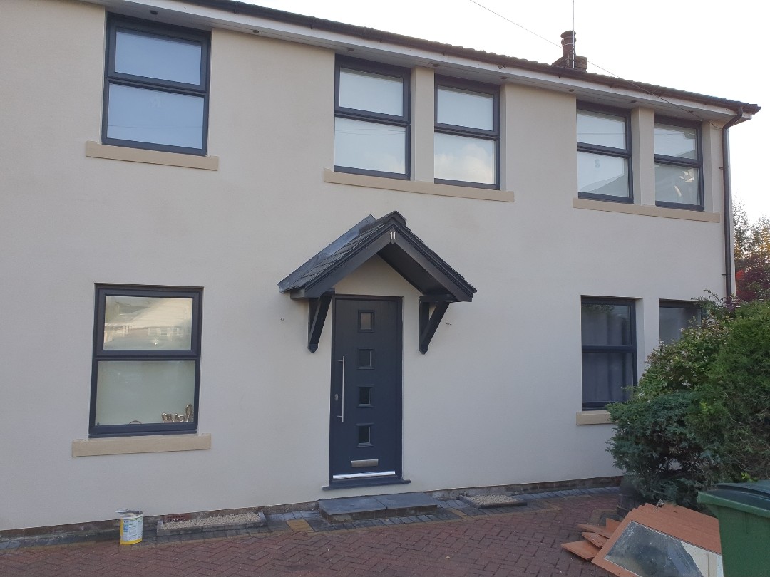Full front elevation re rendered in a smooth light stone finish